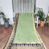 Banarasi Soft Silk Plain Saree In Pastel Green Body And With Antique Zari Mor Motifs On Border And Anchal In Peacock Blue Base