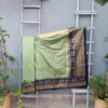 Banarasi Soft Silk Plain Saree In Pastel Green Body And With Antique Zari Mor Motifs On Border And Anchal In Peacock Blue Base