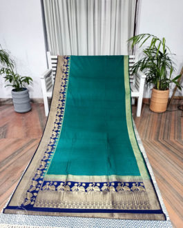 Banarasi Soft Silk Plain Saree In Turquoise Green With Antique Zari Mor Motifs On Border And Anchal In Peacock Blue