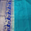 Banarasi Soft Silk Plain Saree In Turquoise Green With Antique Zari Mor Motifs On Border And Anchal In Peacock Blue