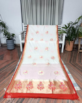 Banarasi Soft Silk In White With Big Circular Zari Boota And Resham Meenakari Floral And Mor Figure Work Red Border And Floral Zari Work On Anchal