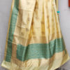 Banarasi Soft Silk In Off-white and Green with Golden Zari Floral Boota All Over And Zari & Brocade Work On Border