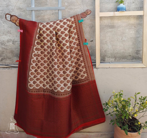 Banarasi Soft Silk Saree In Beige With Red border and Antique Zari Paisley Boota All Over