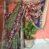 Kalamkari Silk Saree in Green Base with Red Blue Motifs in Off-White