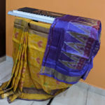 Ikkat Soft Silk Saree In Mustard With Purple Anchal