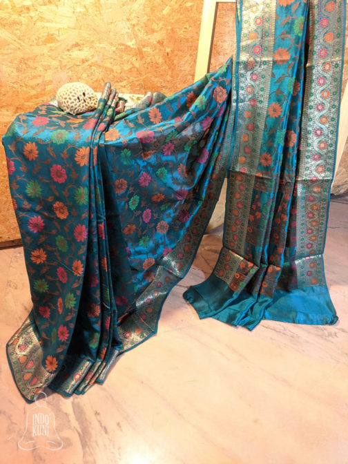 Banarasi Dupion Silk Peacock blue saree with orange pink green brown resham bel boota all over and in anchal with zari border in resham meenakari