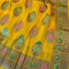 Banarasi Chiffon Yellow Patola saree with zari work and resham meenakari jaal work with floral boota anchal and border with resham meenakari
