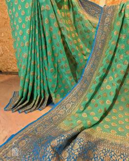 Banarasi Khaddi Georgette Sea Green saree with small paisley copper zari boota Firozi border and anchal with heavy zari floral bel boota work