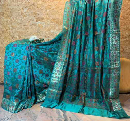 Banarasi Dupion Silk Acqua blue saree with orange pink green brown resham bel boota all over and in anchal with zari border in resham meenakari