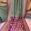 Banarasi Khaddi Georgette Pastel Green saree with golden zari lehariya weave heavy border and anchal in Purple base with zari work