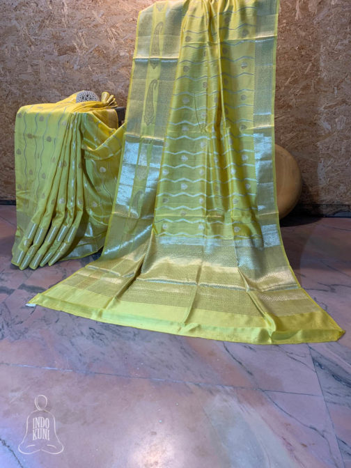 Banarasi Chinia Silk Yellow saree silver zari paisley boota with zig-zag vertical weave all over with zari border and heavy anchal