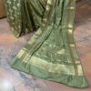 Banarasi Chinia Silk Pastel Green saree with golden zari vertical bel boota weave all over with zari border and heavy anchal