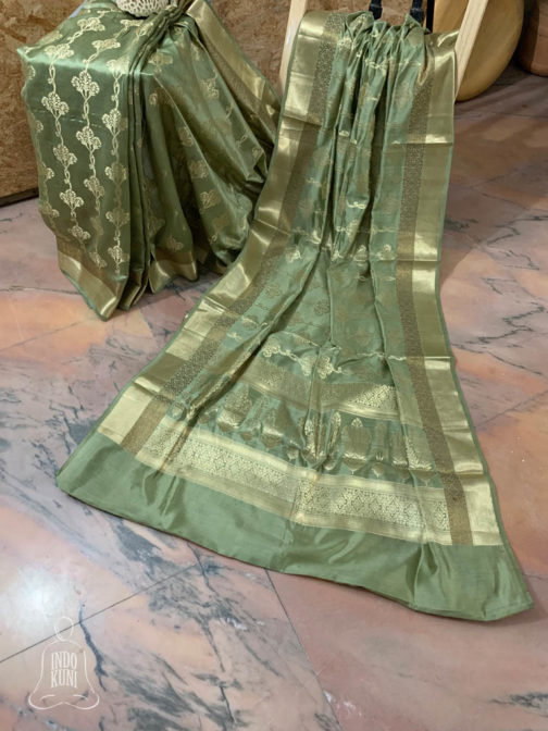 Banarasi Chinia Silk Pastel Green saree with golden zari vertical bel boota weave all over with zari border and heavy anchal