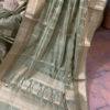 Banarasi Chinia Silk Pastel Green saree with golden zari vertical bel boota weave all over with zari border and heavy anchal