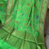 Banarasi Chanderi Cotton Parrot Green saree with zari and intense resham jaal with light blue orange and pink resham meenakari
