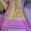 Banarasi Chanderi Cotton Yellow saree with golden zari boota all over magenta border and anchal with heavy zari work