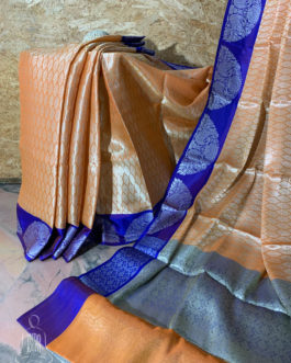 Banarasi Tanchoi Cotton saree with white Resham work on light orange base contrast royal blue border with white resham work and anchal with contrast grey base