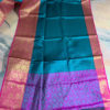 Banarasi Tanchoi Cotton saree with firozi Resham work on dark grey base contrast magenta border with copper zari work and anchal with contrast magenta base