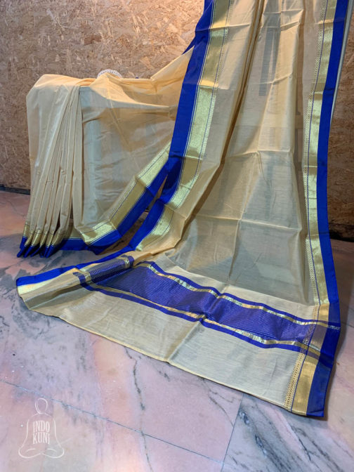 Banarasi Mercerized Cotton Beige saree with royal blue plain lace look border with royal blue block on anchal