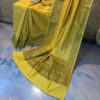 Banarasi Mercerized Cotton Yellow saree with brown resham booti all over and thick border and resham work on anchal