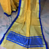 Banarasi Mercerised Cotton Light Orange saree with royal blue plain lace border with royal blue block on anchal