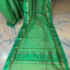 Banarasi Mercerized Cotton Green saree with self check weave green satin look border with golden stripes with anchal in darker green base and golden zari checks