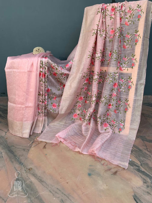 Silk Linen pink saree with zari border and all over floral embroidery