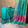 anarasi Silk Cotton Sea green base ikkat weave saree with zari weave mor pattern on border along with dark blue lining and anchal in contrast magenta color