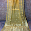 Banarasi Silk Cotton Dupatta Turmeric Yellow color and zari vriksha boota along side the zari border and small floral boota in the body accompanied with intricate zari boota (anchal style) pattern at the sides