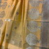 Banarasi Silk Cotton Dupatta Turmeric Yellow color and zari vriksha boota along side the zari border and small floral boota in the body accompanied with intricate zari boota (anchal style) pattern at the sides