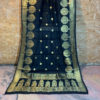 Banarasi Silk Cotton Dupatta Black color and zari vriksha boota along side the zari border and small floral boota in the body accompanied with intricate zari boota (anchal style) pattern at the sides