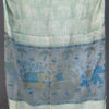 Pure Pashmina stole light sea green color with self woven elephant figure and elephant figure on border woven in blue and mustard color