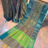 Banarasi Linen Saree in double tone gold and blue color with gold and copper zari work